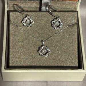 10K White Gold and Diamond earring set.